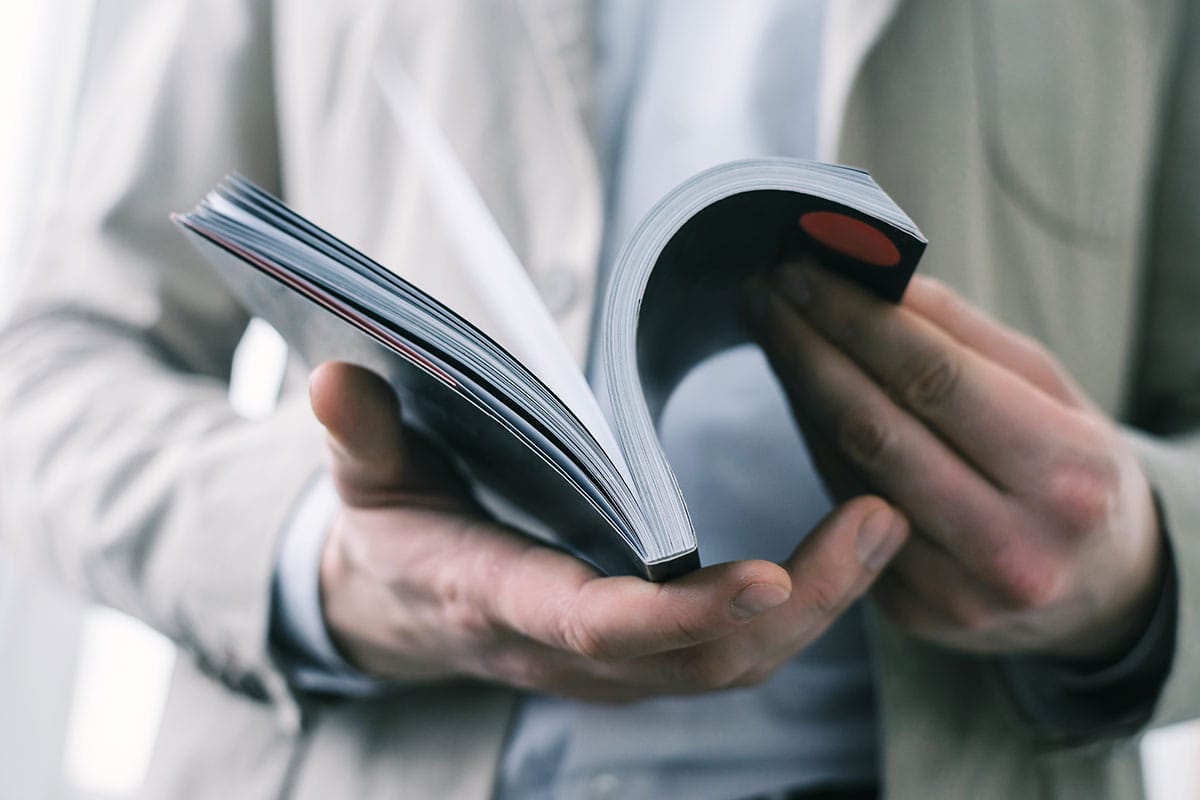 book-flipping Close up of hands flipping through a book