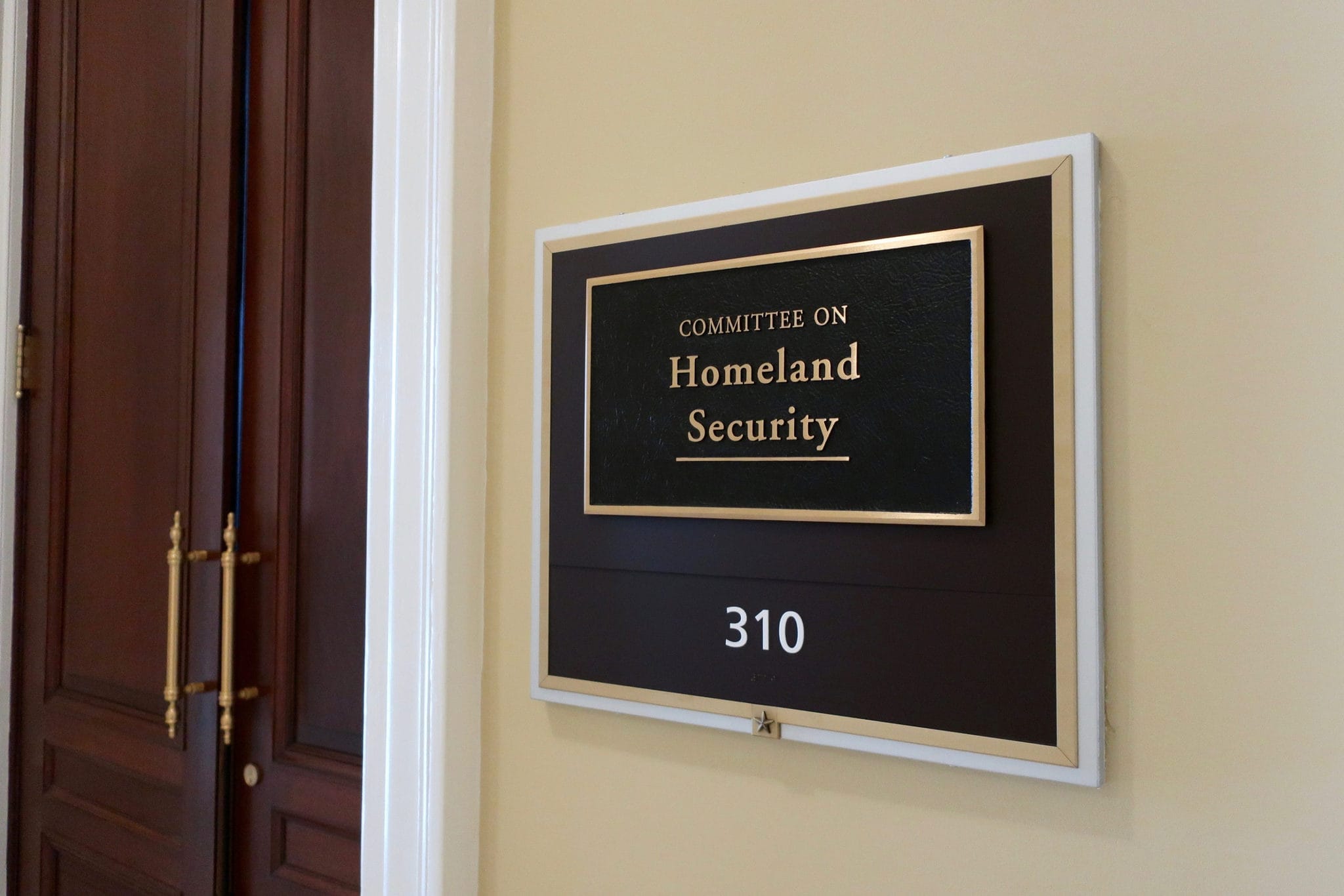 U.S. House of Representatives Committee on Homeland Security sign outside meeting room