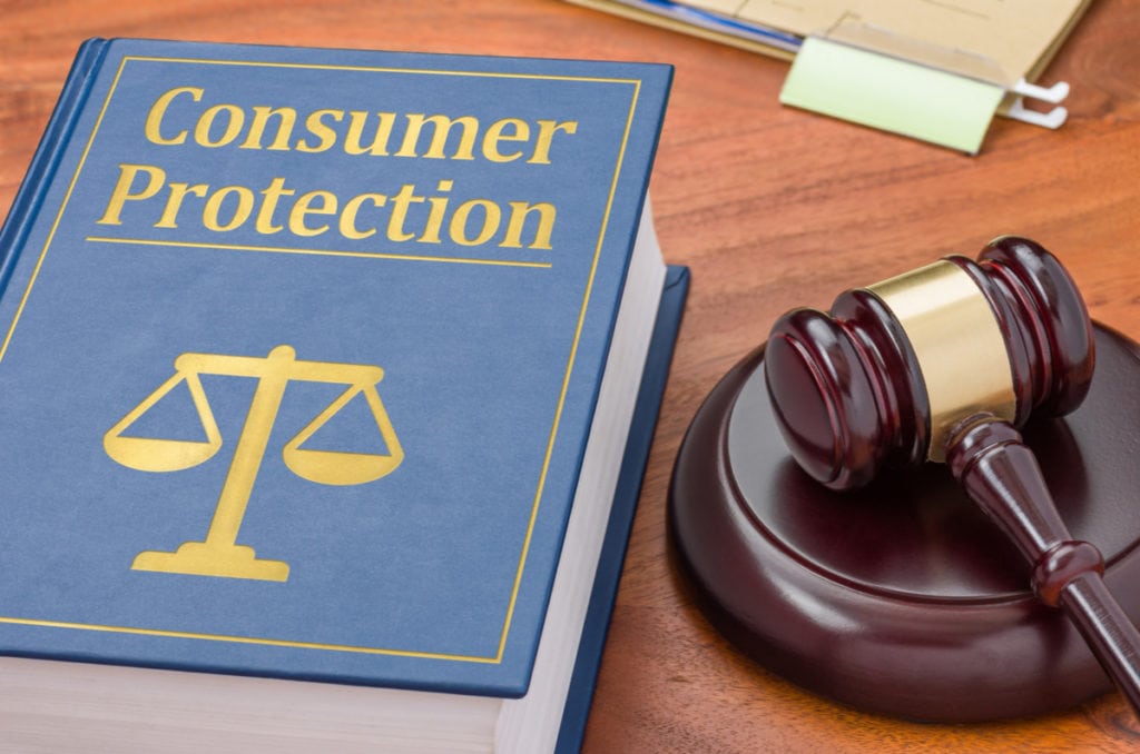 consumer protection law book and gavel