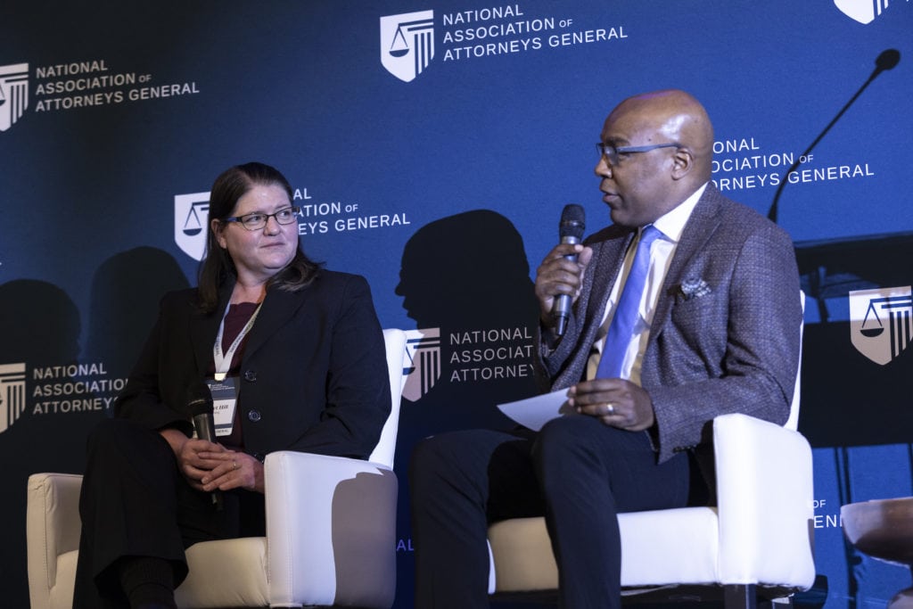 Wyoming Attorney General Bridget Hill and Illinois Attorney General Kwame Raoul moderate a panel on civil rights in America. 