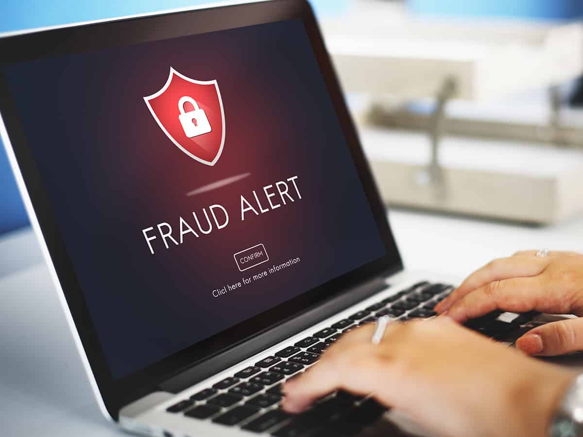 Fraud alert on computer screen