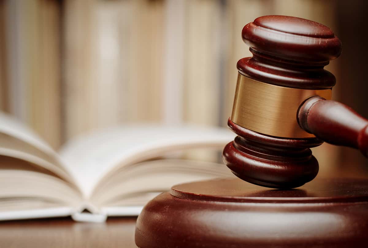 gavel and book on desk