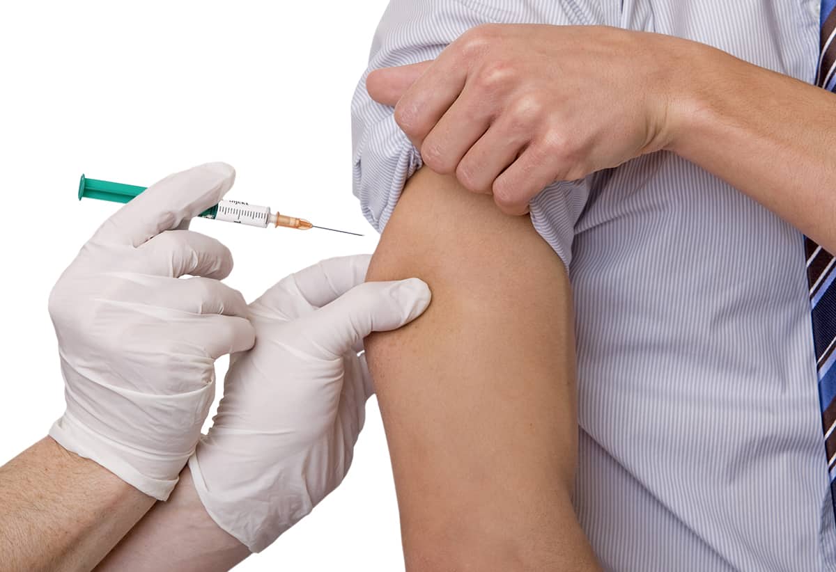 Man receives a vaccination shot